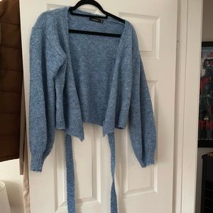 Blue wrapped tie sweater